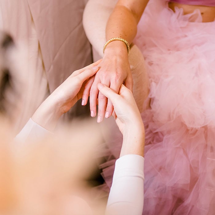 A hand massage during a Lash Spa appointment